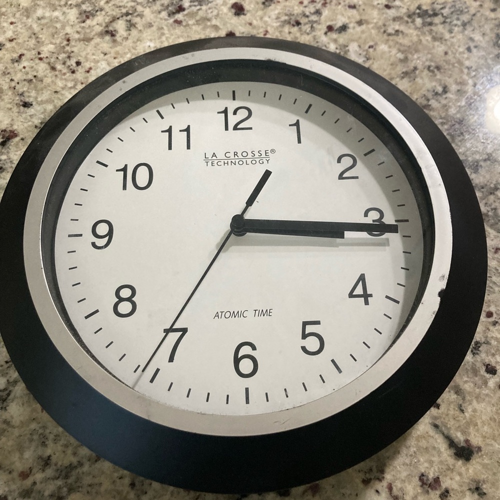La Crosse Technology atomic analog wall clock has scuffs but works normally